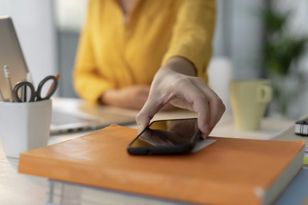 Woman answering a phone call on her smartphone